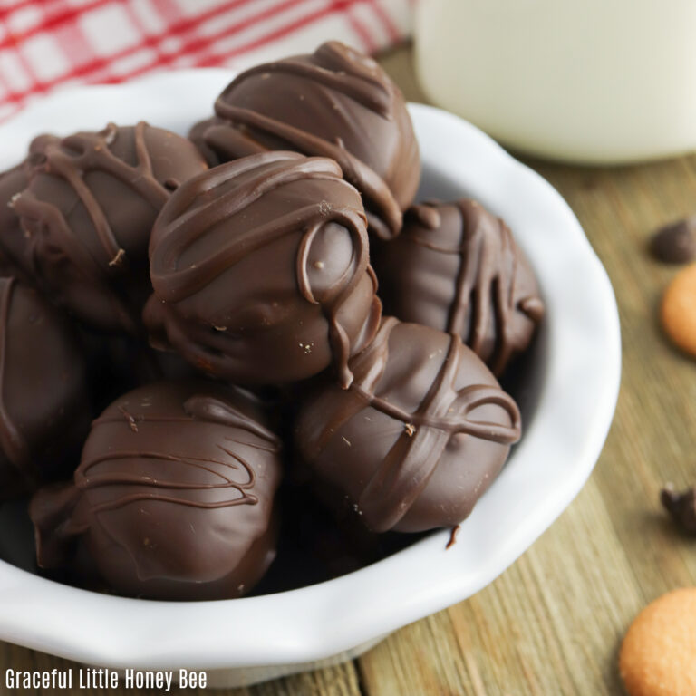 Twix Cookies piled in a white bowl.