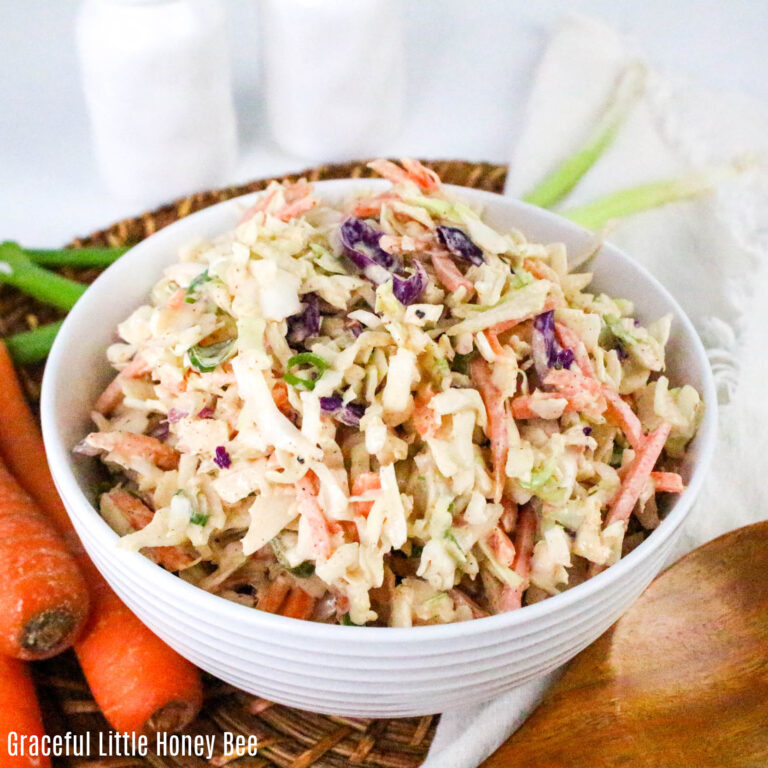 A white bowlful of Cajun Coleslaw.