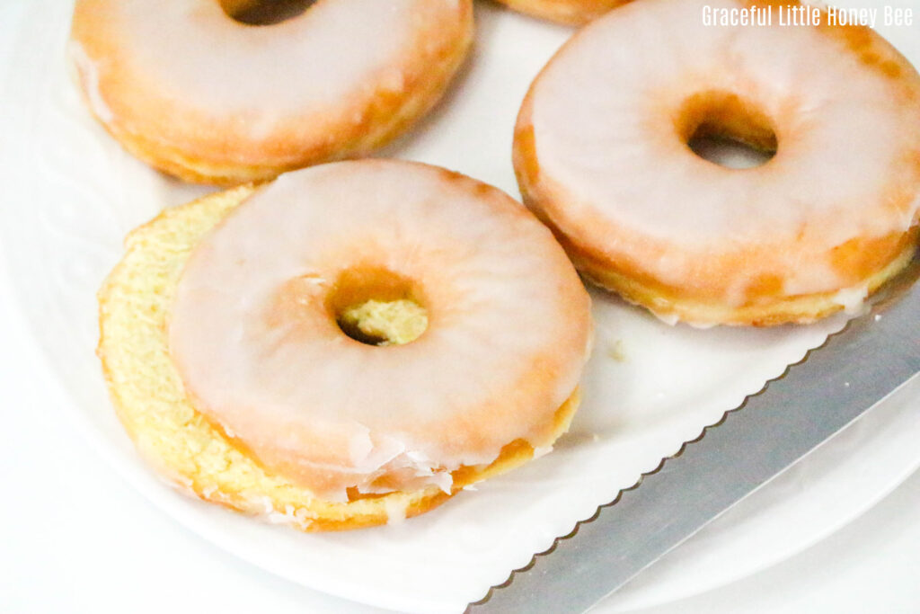 Sliced glazed donuts.
