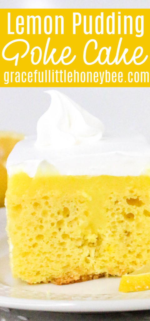 Close up view of a slice of Lemon Pudding Poke Cake topped with whipped cream.
