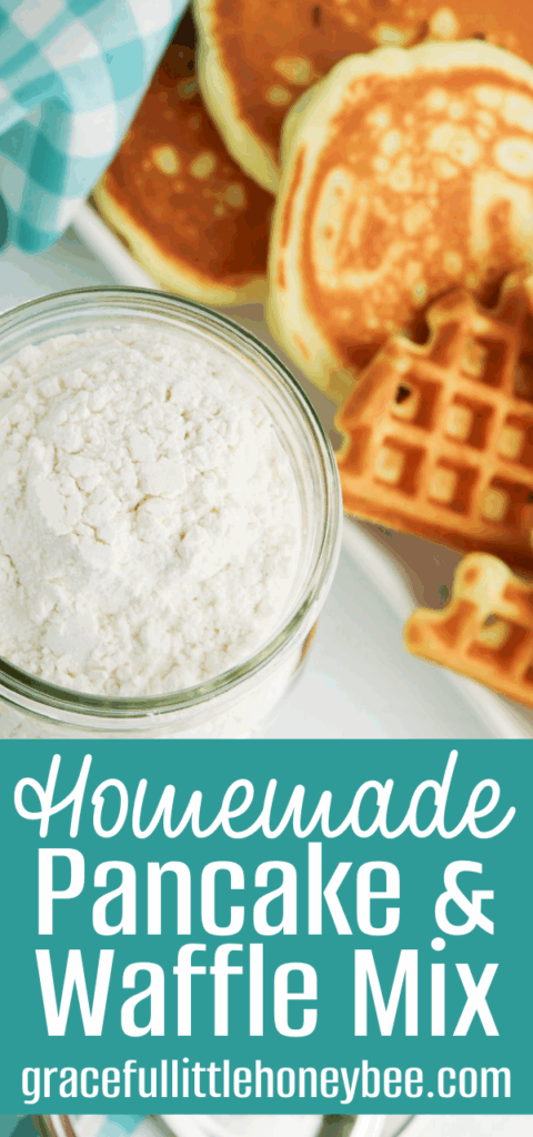 Aerial view of pancake mix in a mason jar with plate of pancakes and waffles in the background.