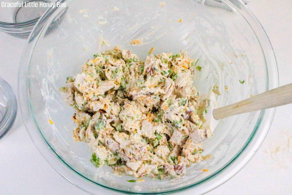 Jalapeno popper salad in a glass mixing bowl.