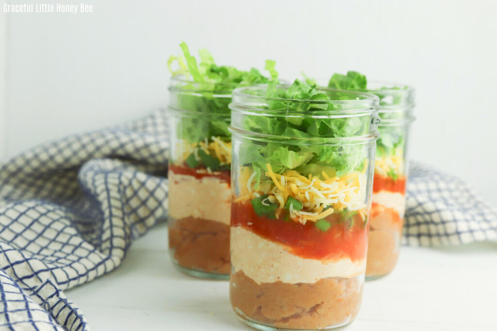 Side view of 7-layer dip in a jar.