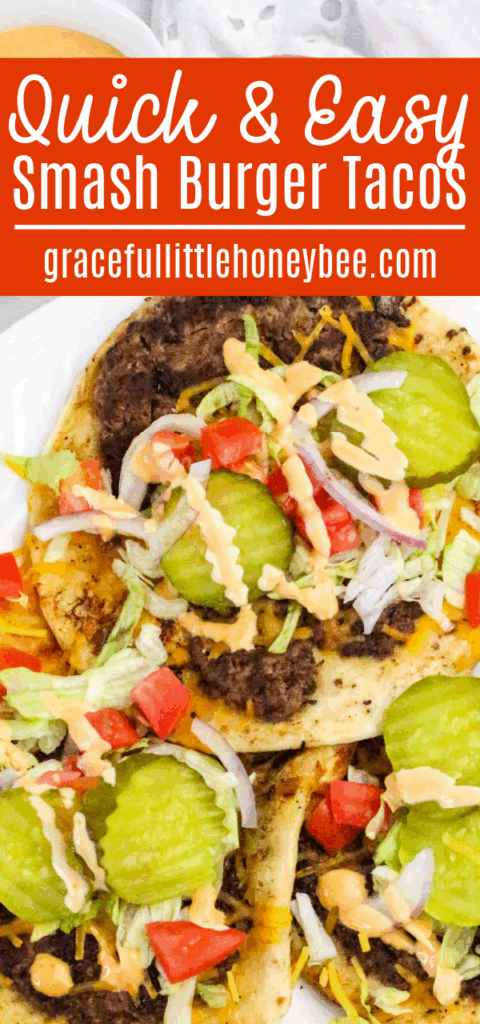 Aerial view of three smash burger tacos on a white plate.