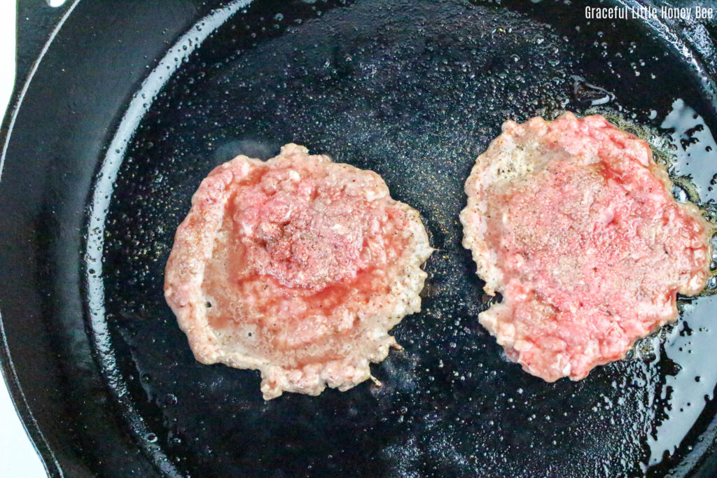 Smashed beef in a skillet.
