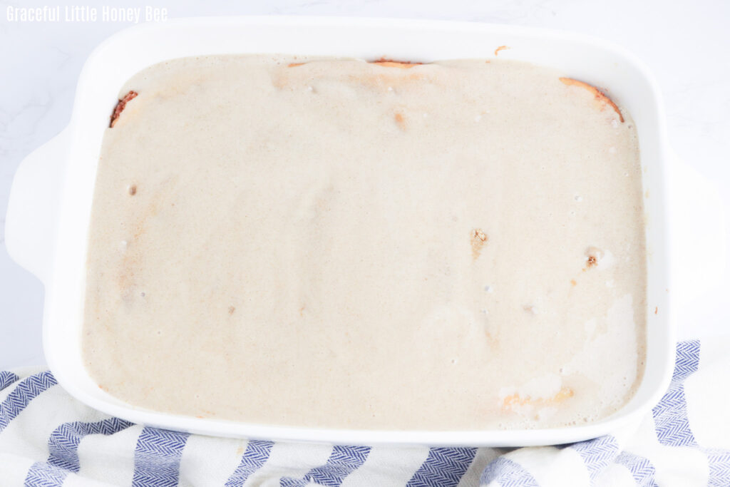 Cake topped with condensed milk.