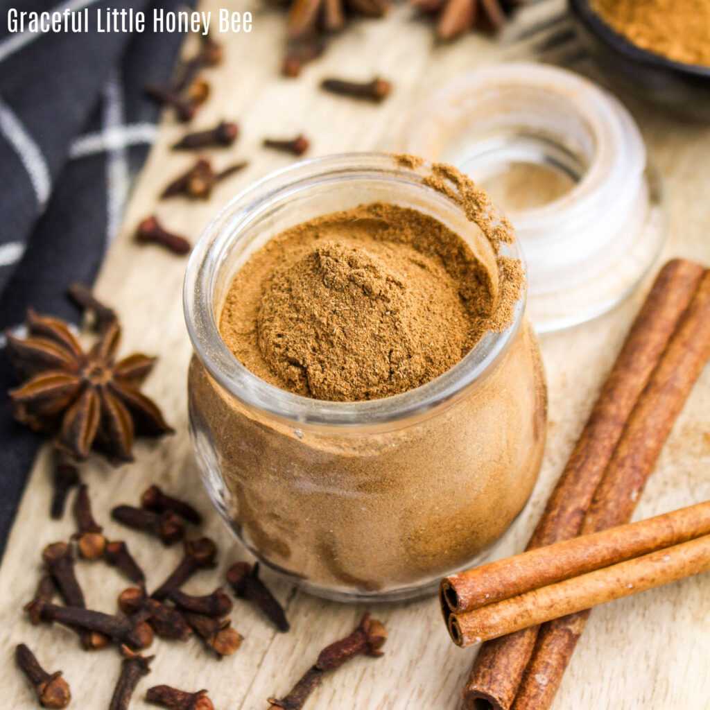 Top view of pumpkin pie spice in a glass jar.