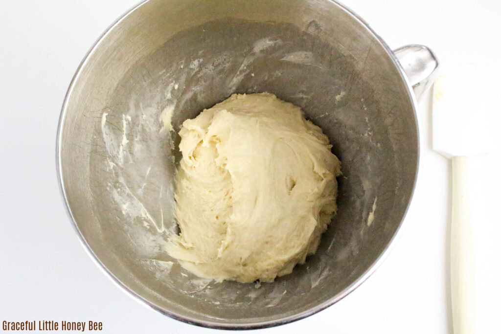 Shaggy dough in a mixing bowl.