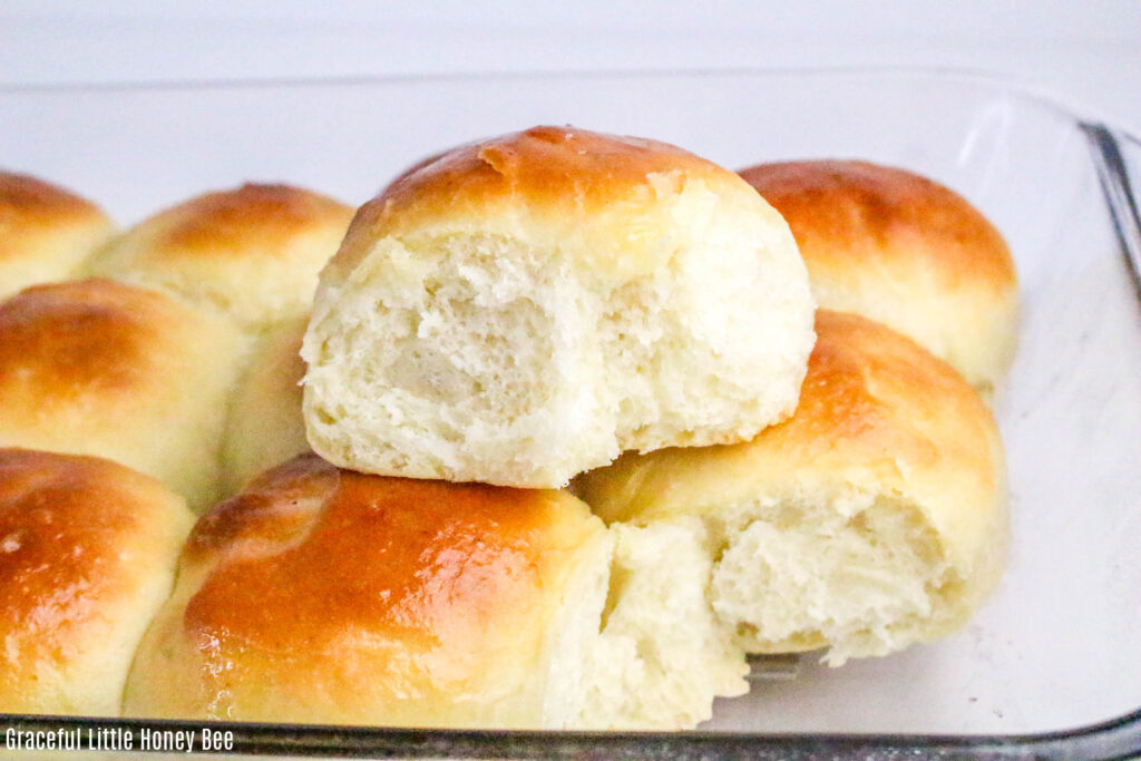 Golden brown rolls in a casserole dish.
