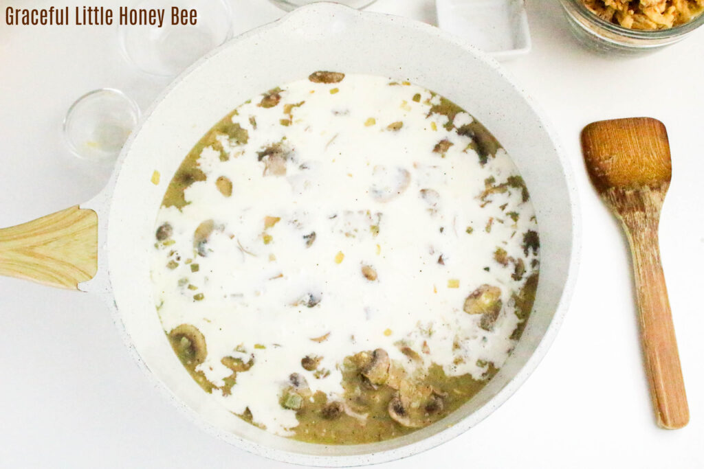 Mushroom sauce topped with milk.