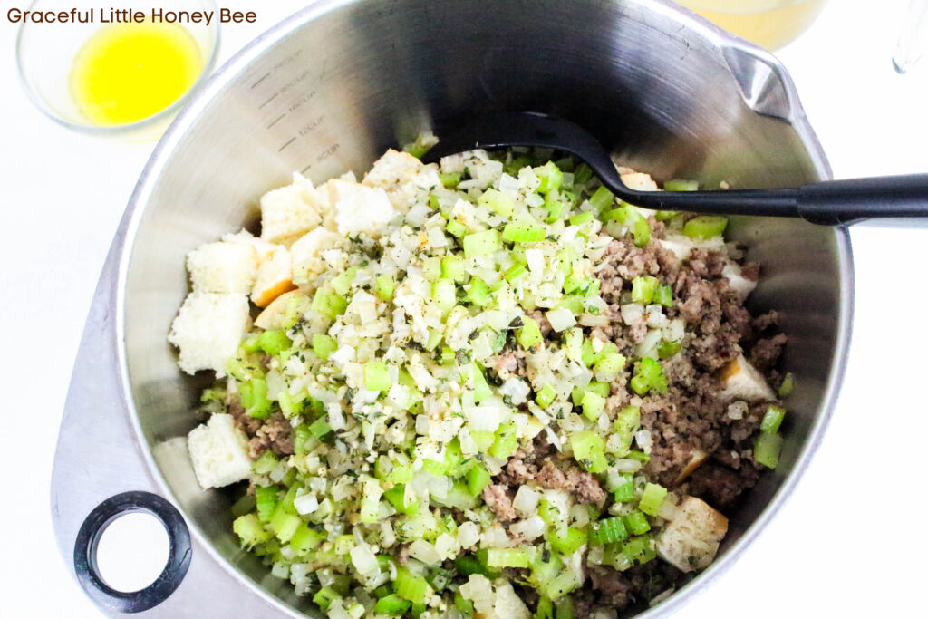 Ingredients for stuffing in a mixing bowl.