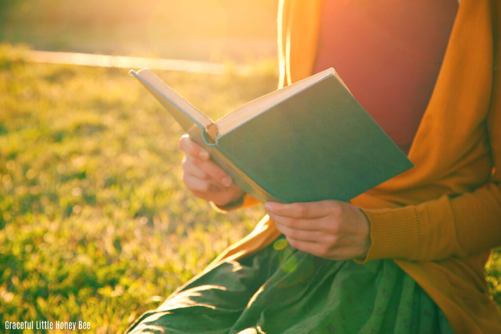 Women reading book.