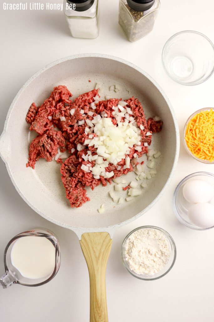 Aerial view of ground beef and onions in skillet.